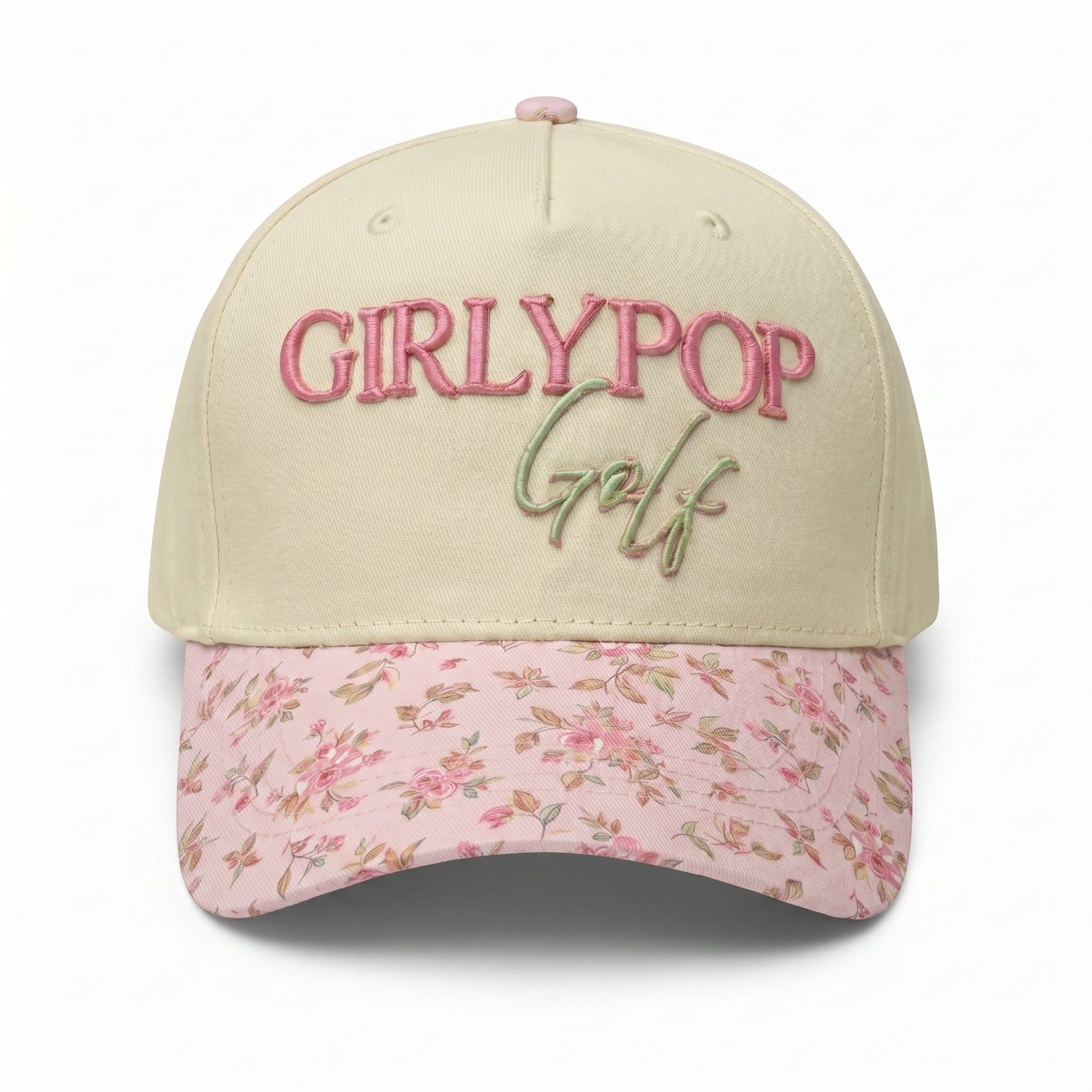 The Girly Pop Cap in cream with a pink floral printed brim and raised embroidered lettering.